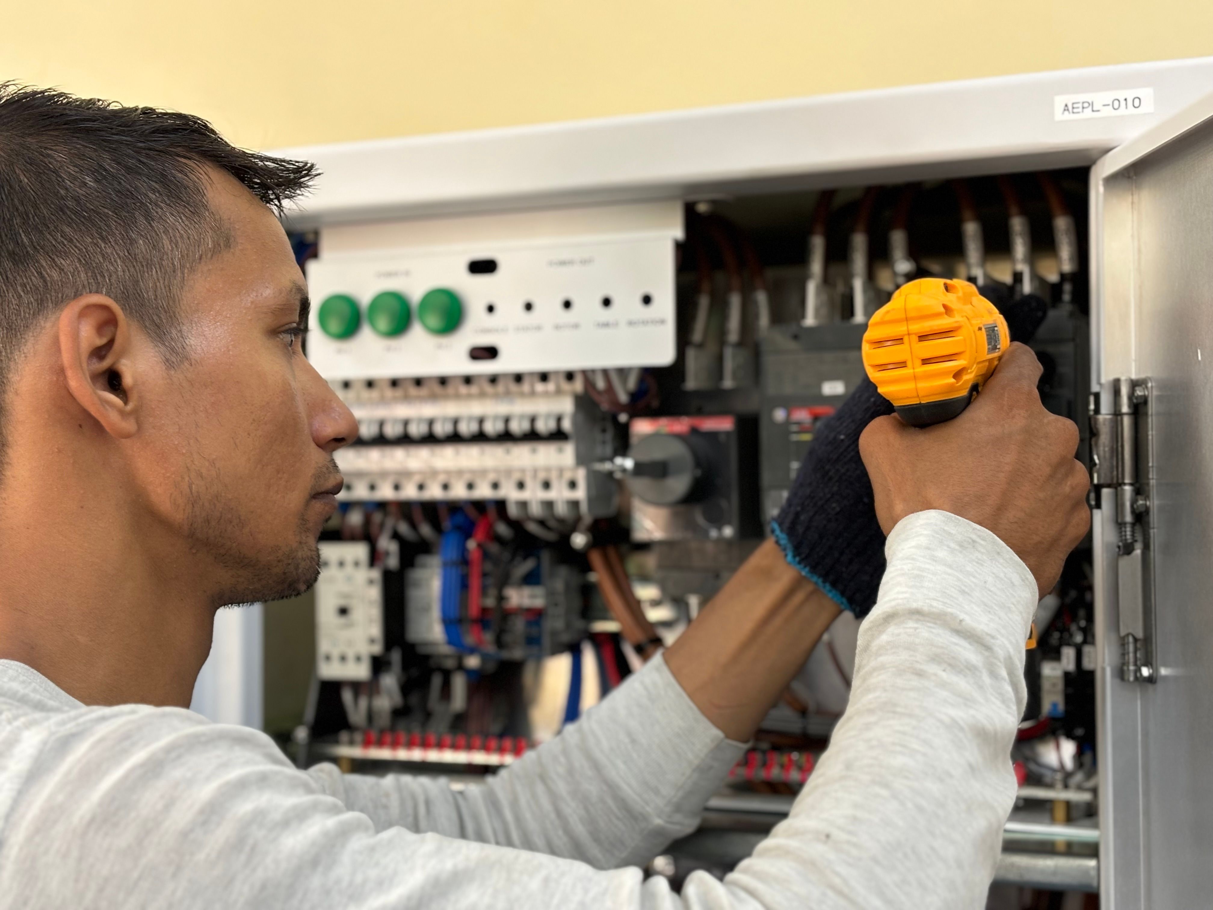IronVolt electrician working on a home switchboard
